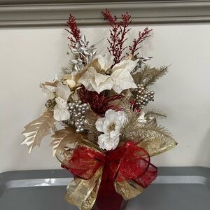 Festive Holiday Floral Arrangement with Red and Gold Accents